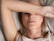 Woman with Menopause Trying To Sleep