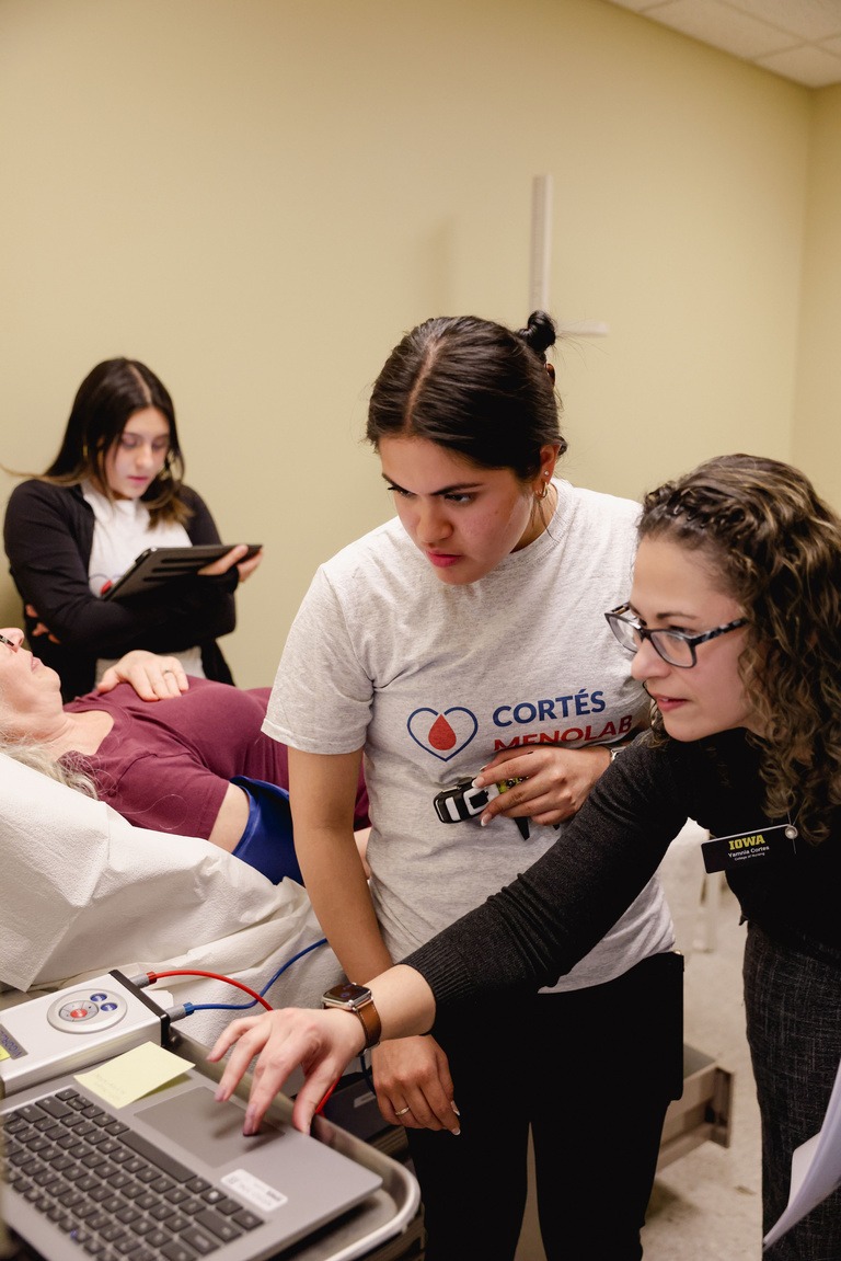 Dr. Yamnia Cortés works with an undergraduate student research assistant in April 2024